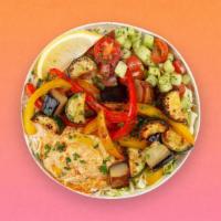 Grilled Mixed Veggie Hummus Bowl · Original hummus topped with fresh grilled veggies, romaine cucumber tomato salad, tahini, an...