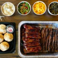 Easy Feast - Brisket & Ribs · Served family-style for 4 or more.. Your choice of St. Louis or baby back ribs and beef bris...