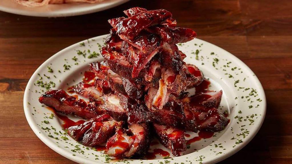 BBQ RIB TIP APPETIZER · St. Louis pork rib tips marinated in our original BBQ sauce, slowly hickory smoked and finished on the grill.
