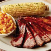 BBQ TRI TIP · Certified Angus Beef tri tip, smoked all day until it melts in your mouth. Hand-carved to or...