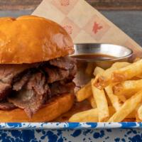 LUCILLE'S BBQ TRI TIP SANDWICH · Our slow-smoked, certified Angus beef tri tip, hand-carved to order, piled high on a soft br...