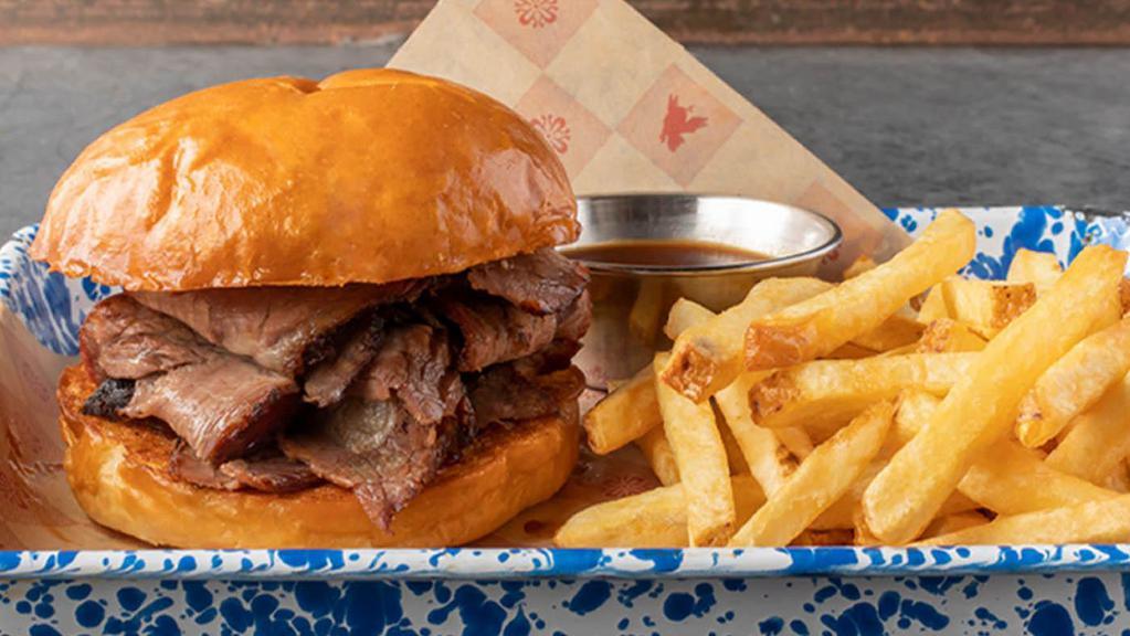 LUCILLE'S BBQ TRI TIP SANDWICH · Our slow-smoked, certified Angus beef tri tip, hand-carved to order, piled high on a soft brioche bun.