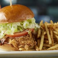 SOUTHERN FRIED CHICKEN SANDWICH · Fried chicken breast, applewood bacon, jack cheese, vine-ripened tomato and lettuce with ran...