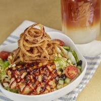 BBQ CHICKEN SALAD · Grilled chicken breast on a bed of fresh greens, BBQ ranch dressing, tomatoes, grilled sweet...