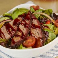 Tri Tip Salad · Slow-smoked tri tip, hand-carved to order and served on a bed of mixed field greens, tomatoe...