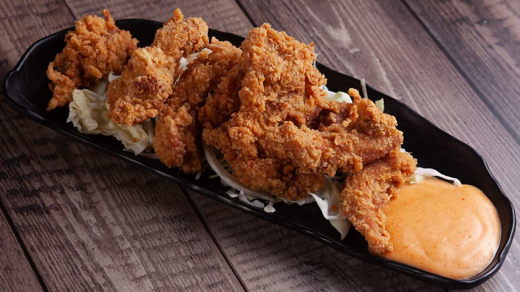 Chicken Karaage · Japanese style popcorn chicken with a side of spicy mayo.