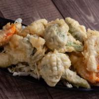 Vegetable Tempura · Japanese style assorted fried vegetables. Includes broccoli, zucchini,sweet potatoe, and oni...
