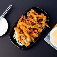 Geso Fry · Fried squid legs with a side of spicy mayo.
