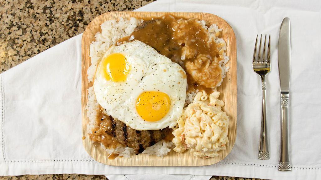 Loco Moco · Savory homemade hamburger patties over rice covered with brown gravy and topped with eggs. Served Island style a local favorite.