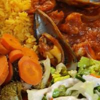Los Dos Compadres Plate · Spicy. Shrimp and octopus mixed with grilled mushrooms, grilled onions and spicy los dos com...