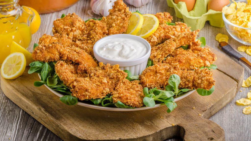 Crispy Lemon Pepper Chicken Tenders Basket · Tasty Crispy Chicken Tenders, tossed with Lemon Pepper sauce, and fried to perfection. Served on customer's choice of fries.