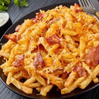 Turkey Bacon N' Cheez Loaded Fries · Crispy Turkey bacon, melted cheese, and onions, served on a bed of perfectly seasoned golden...