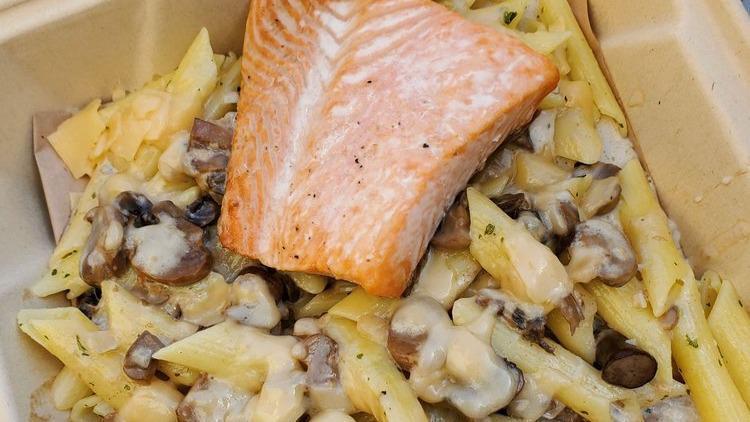 Salmon Fillet · Penne pasta, creamy mushroom sauce, and shaved parmesan.
