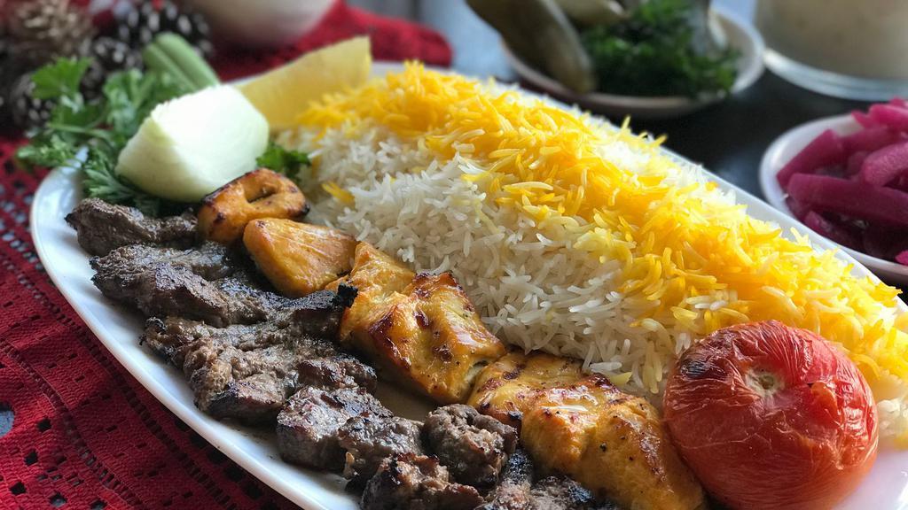 Combination Kabab Meal (Rice & Salad) · Fresh off the grill skewers prepared to customer's choice. Served on a bed of rice with a side salad.