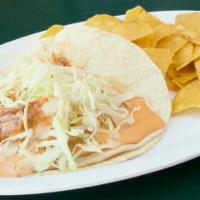 Fish · our famous grilled fish taco served in a soft corn tortilla with cabbage mix and chipotle sa...