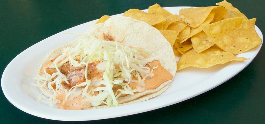 Fish · our famous grilled fish taco served in a soft corn tortilla with cabbage mix and chipotle sauce.