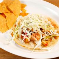 Shrimp · Our famous grilled shrimp taco served in a soft corn tortilla with cabbage, chipotle sauce a...