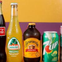 Bottled Sodas · Pepsi Bottled, Coca Cola Glass, Jarrito(Jarritos flavors may vary)