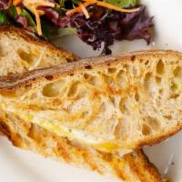 Grilled Cheese · Cheddar cheese, Gruyere, mozzarella, and green onions on Starter Bakery whole wheat levain a...