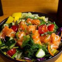 Salmon Poke · Fresh salmon and veggies with Hawaiian sauce.