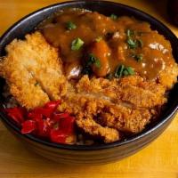Katsu Chicken Curry Combo · A Japanese curry with a chicken cutlet on top. Served with Choice of two add-ons and miso so...