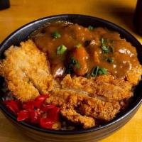 Katsu Pork Curry Combo · A Japanese curry with a pork cutlet on top.  Served with Choice of two add-ons and miso soup...