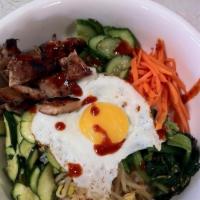 Bi Bim Bop · Vegetables over rice with egg.
