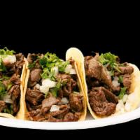 4 TACOS · Four tacos with meat, onions, cilantro & salsa