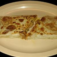 PLAIN QUESADILLA · Grilled flour tortilla stuffed with cheese.