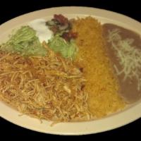 SHREDDED CHICKEN PLATE · Shredded chicken served with rice, refried beans topped with cheese, sour cream, guacamole, ...