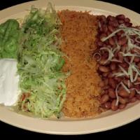 VEGGIE PLATE · Grilled veggies, rice, whole pinto beans topped with cheese, lettuce, sour cream, cheese, gu...