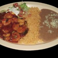 A LA DIABLA SHRIMP · Shrimp sauteed with a special homemade style spicy sauce.  Served with rice, refried beans t...