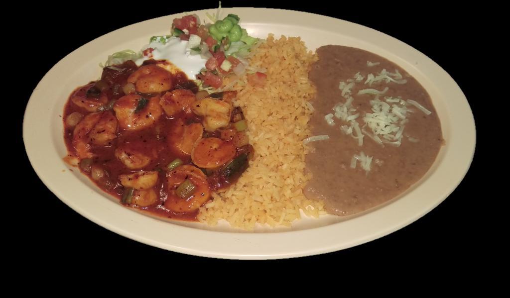 A LA DIABLA SHRIMP · Shrimp sauteed with a special homemade style spicy sauce.  Served with rice, refried beans topped with cheese, sour cream, guacamole, salsa and tortillas.