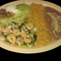 GARLIC SHRIMP  · Shrimp sautéed with garlic and onions.  Served with rice, refried beans topped with cheese, ...