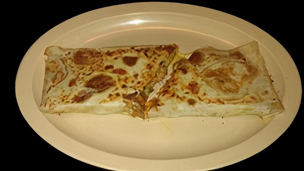 QUESADILLA SUIZA VEGGIE · Grilled veggies in a flour tortilla with melted cheese, sour cream, guacamole and salsa.