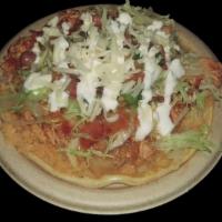 SUPER TACO VEGGIE · Grilled veggies, on a big corn tortilla, topped with rice, whole beans, lettuce, sour cream,...