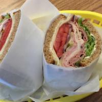 Supreme · Turkey, ham, roast beef on Dutch crunch with Swiss comes with mayo, mustard, lettuce, tomato...