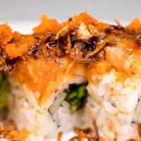 Titanic Roll · Ebi tempura, cucumber topped with avocado, salmon, maguro, and snow crabmeat with sweet or s...