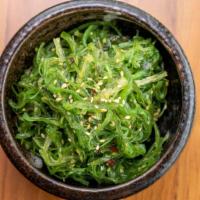 Wakame Salad · Seaweed seasoned with sesame seeds.