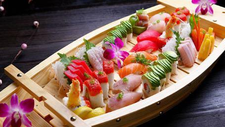 Sashimi Deluxe · 45 pieces of assorted raw fish.