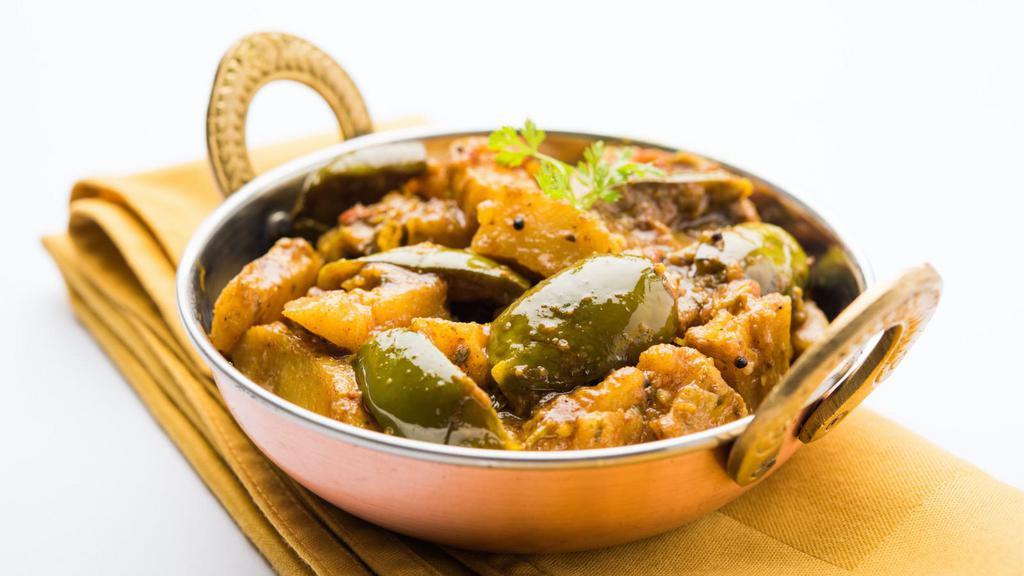 Vegan Aloo Benghan · Freshly cooked potatoes, eggplant, mixed with herbs and indian spices.