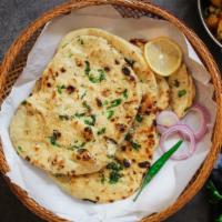 Vegan Non-Butter Naan · Fresh bread baked in clay oven.