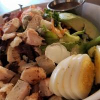Tad's Cobb Salad · fresh mixed salad greens, avocado, hard boiled eggs, bacon, chicken breast, blue cheese with...