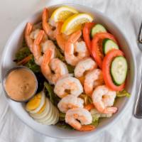 Shrimp Louie Salad · chilled poached shrimp on fresh salad greens, hard boiled eggs, tomatoes, and creamy louie d...