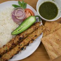 Ground Chicken Kabob · Ground chicken, marinated and char-broiled. Served with white rice, afghan bread, shor nakho...