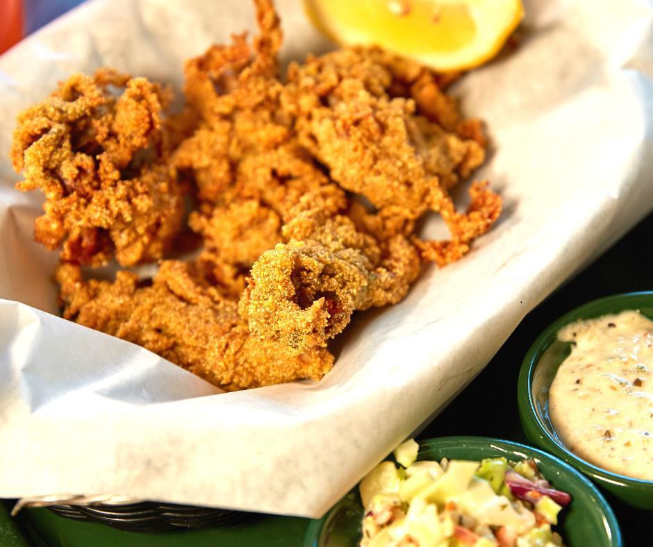 Fried Oyster Basket · Four large oysters, deep fried in a Cajun cornmeal batter and served with a side of rémoulade sauce for dippin'.