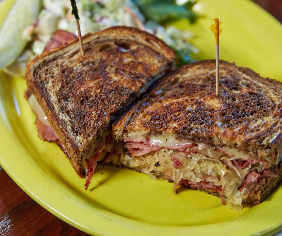 Reuben · Thinly sliced grilled pastrami with Swiss cheese and sauerkraut. Served on grilled rye.