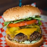 The Homer Simpson · Beef patty, pickles, Cheddar cheese.