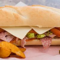 Italian Sub · Our oven-baked Baguette Roll layered with deli-style Salami, Smoked Ham, Pepperoni, Mozzarel...