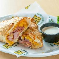Ham & Cheese Hot Hat · A classic. Smoked ham and three cheeses stuffed into our pizza dough shell. 580 calories.